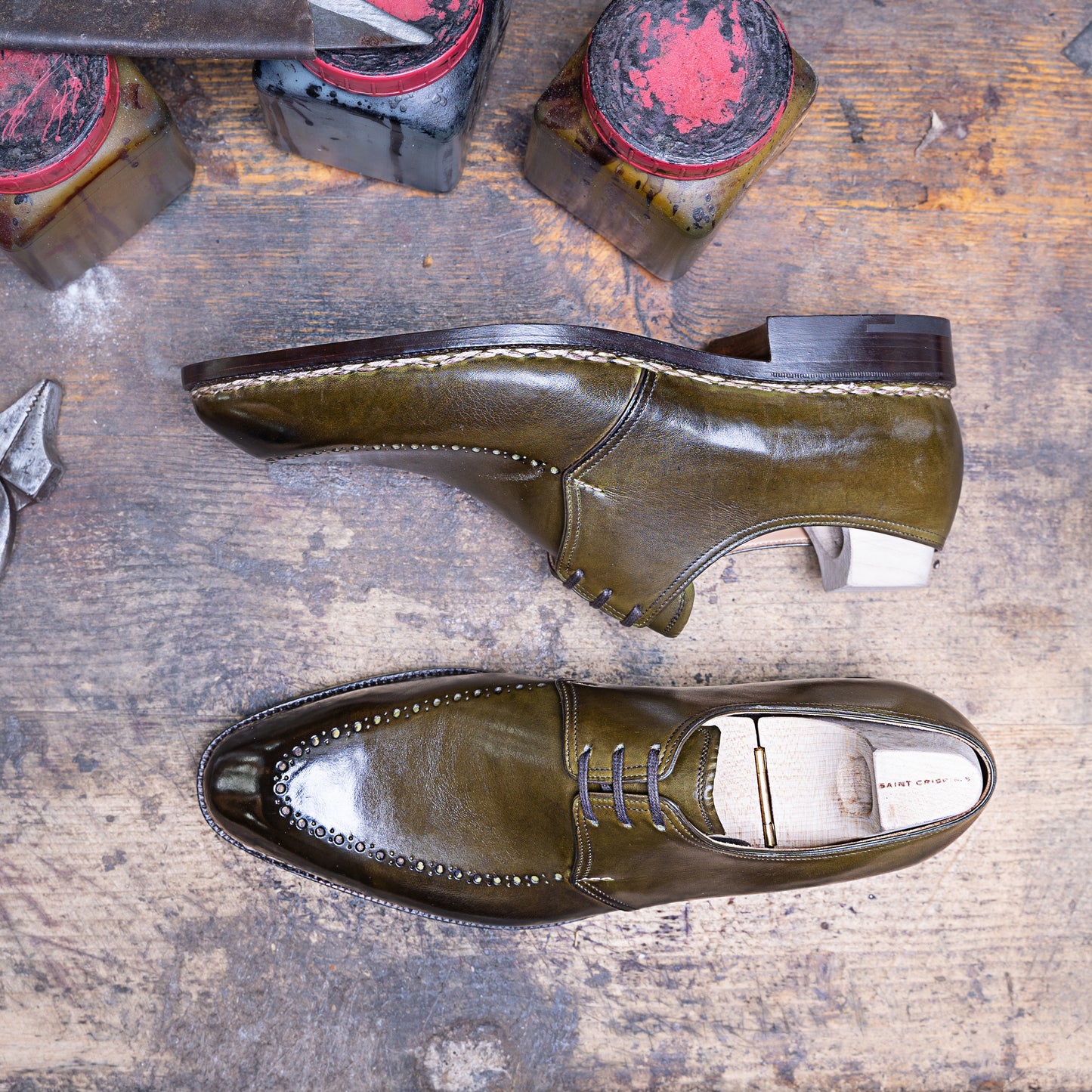 Three eyelet Derby with brogued apron in antique olive green crust calf leather
