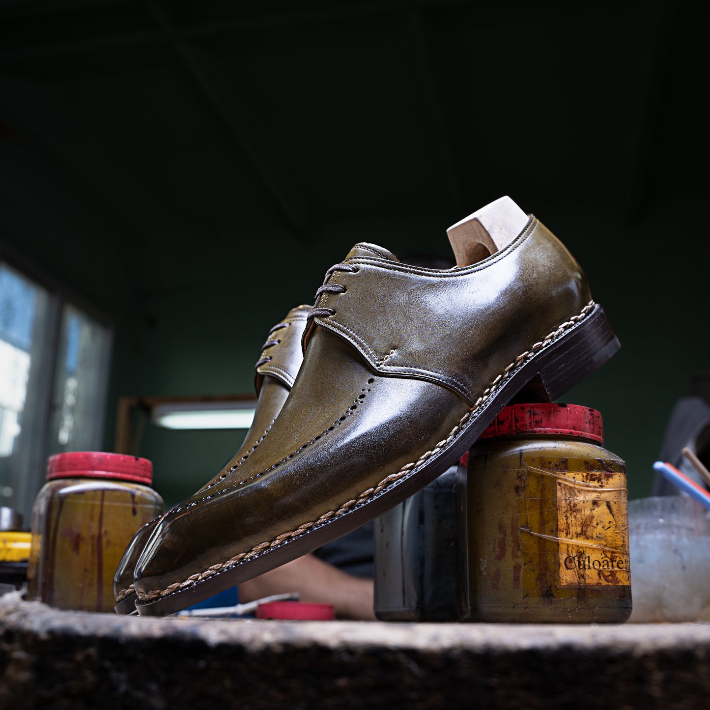 Three eyelet Derby with brogued apron in antique olive green crust calf leather