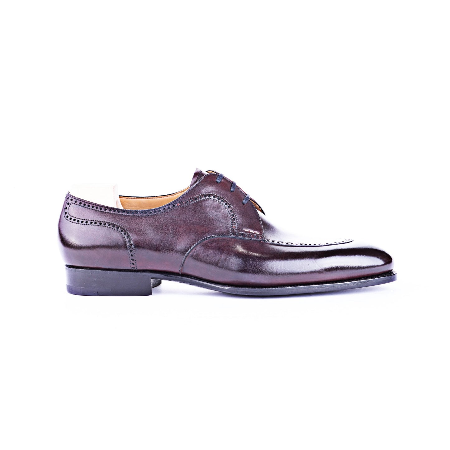 Derby with three eyelets and brogue apron