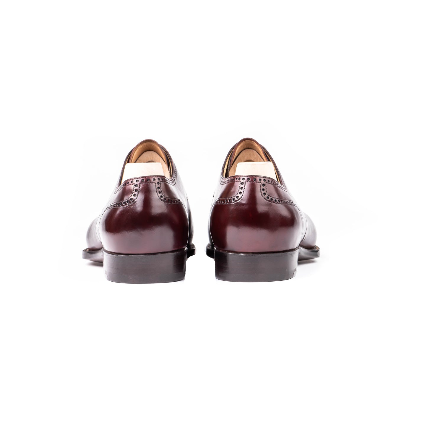 Swan neck Derby with three eyelets in Midnight Burgundy