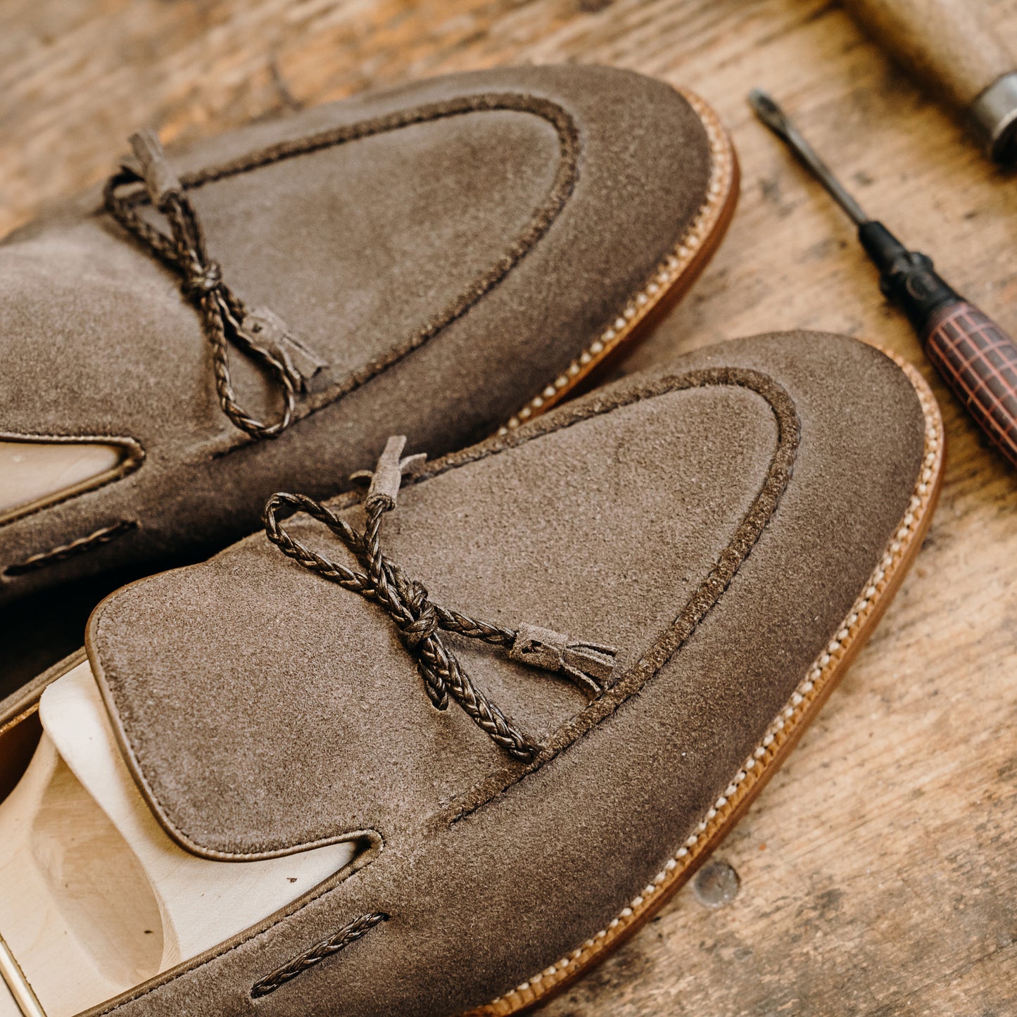 Norwegian slip-on with braided band and tassels