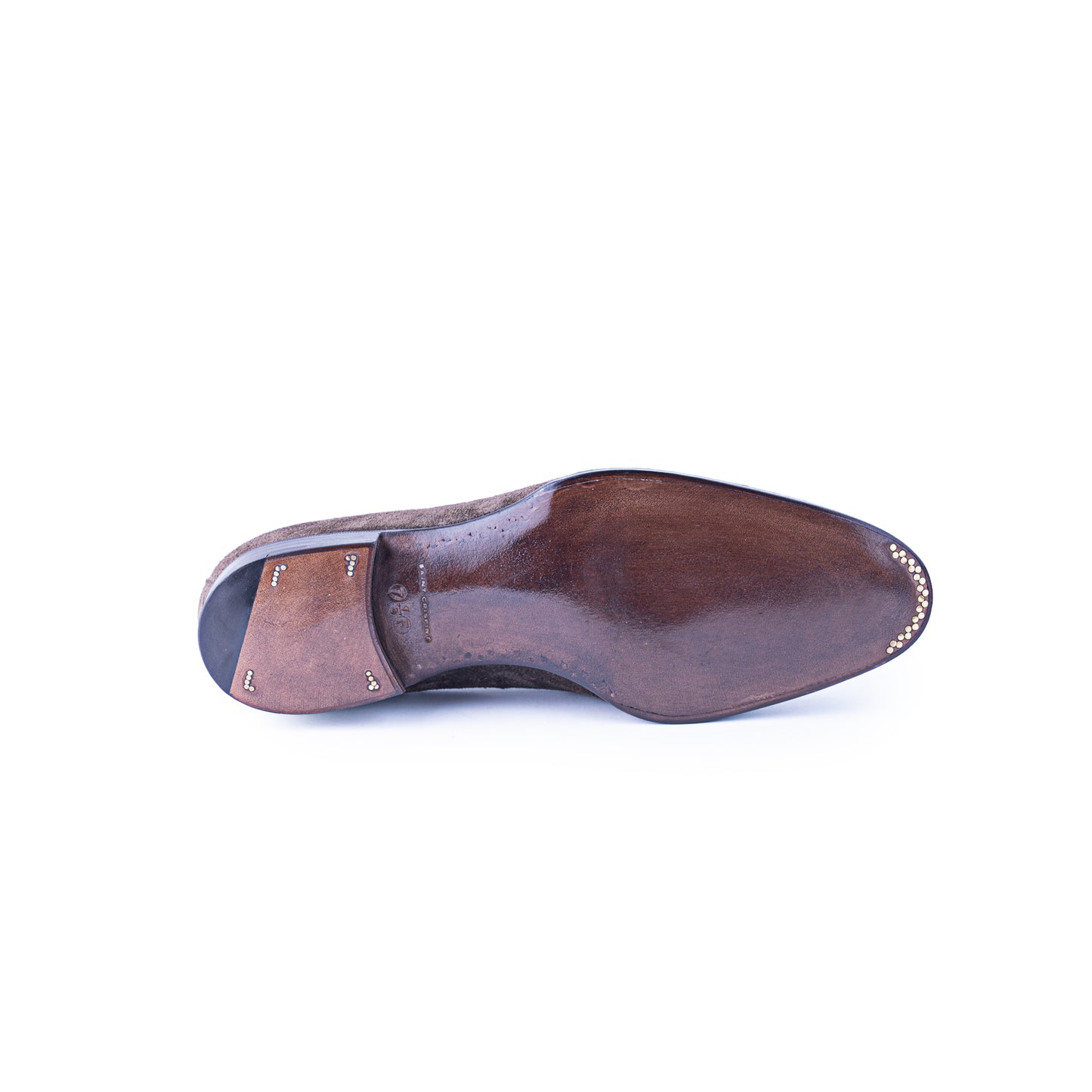Loafer with hand stitched apron and tassels