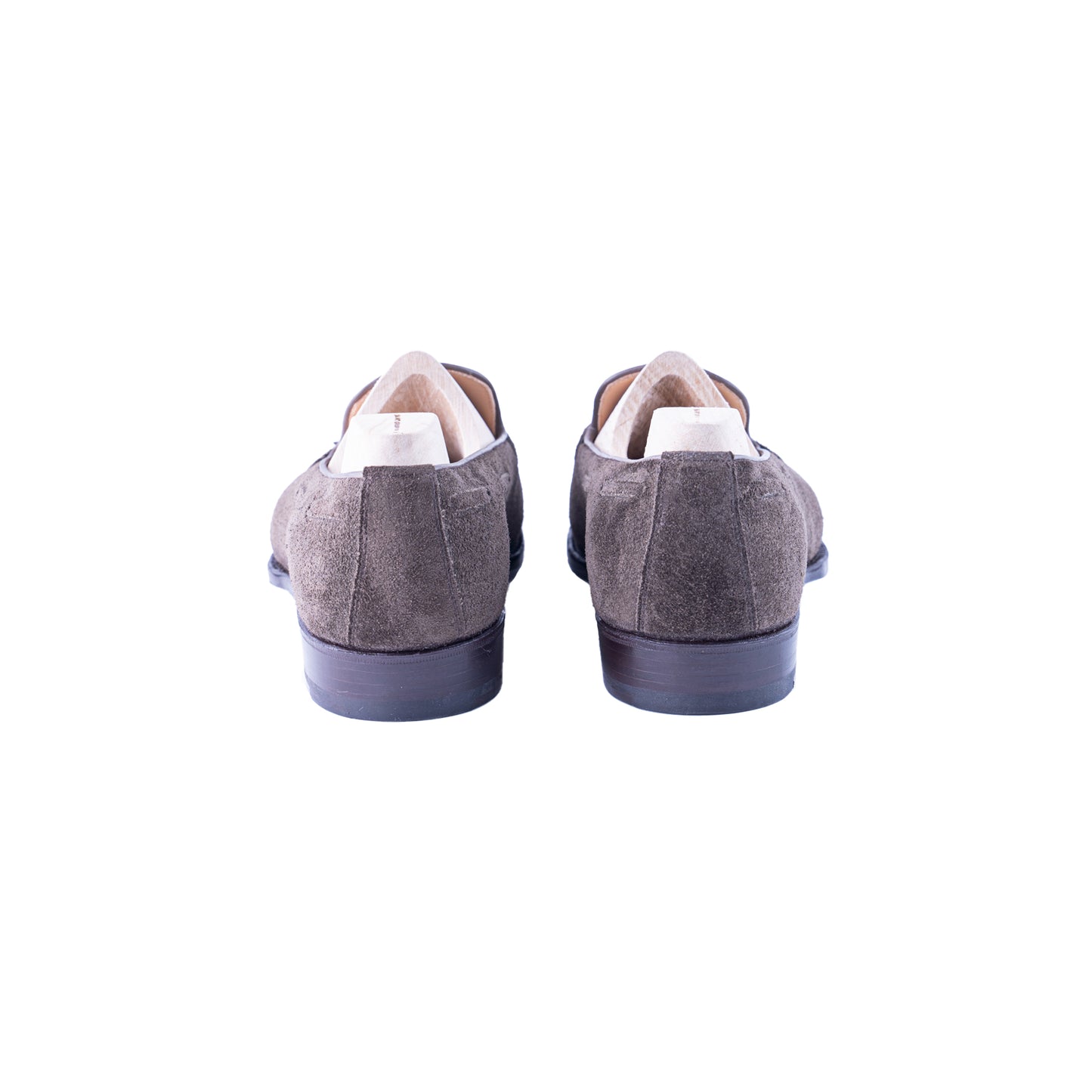 Loafer with hand stitched apron and tassels