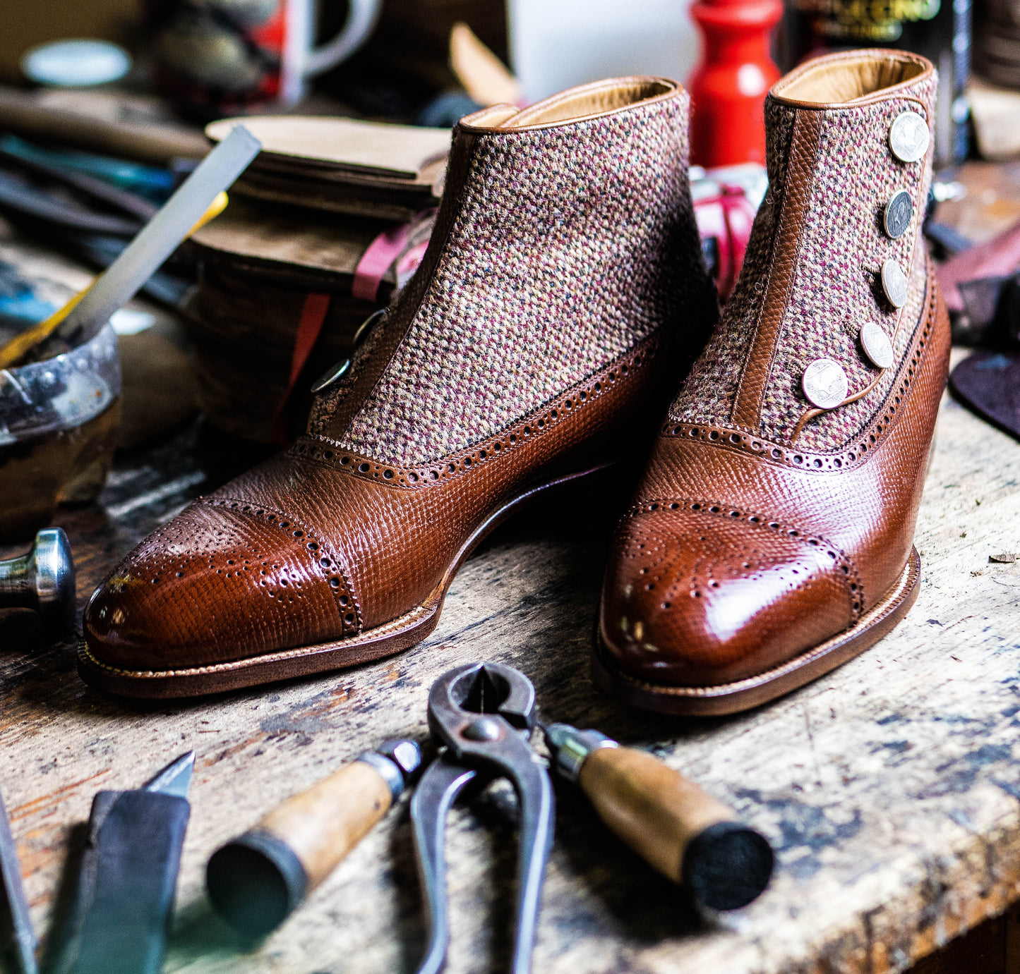 Button boots with hand-stained patina