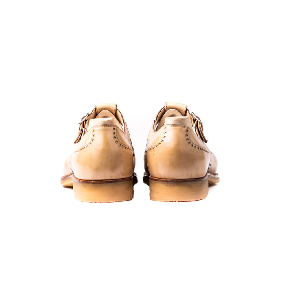 Single buckle Monk sandals, perforated long wing tip