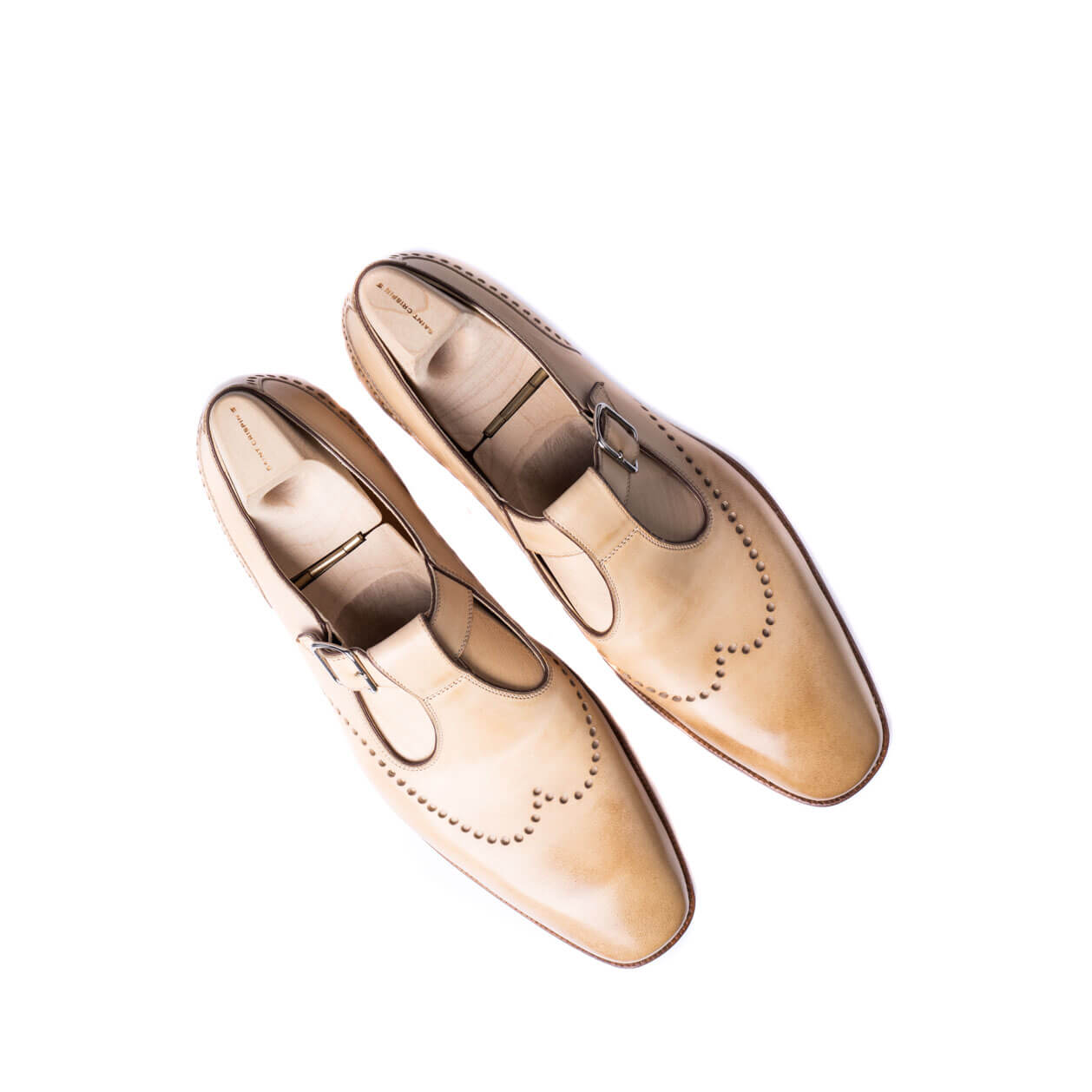Single buckle Monk sandals, perforated long wing tip