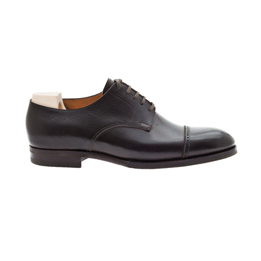 Five eyelet Derby with brogued, straight toe cap in dark brown Inca grain leather