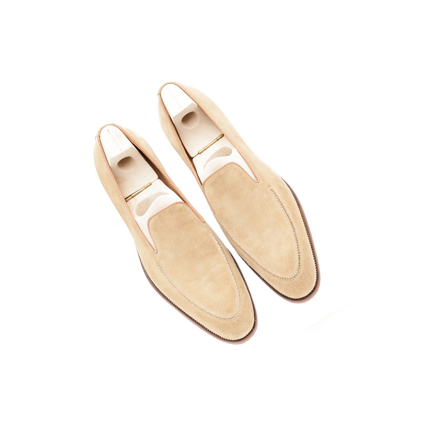 Elegant Loafer with hand-stitched apron in sand-beige suede leather