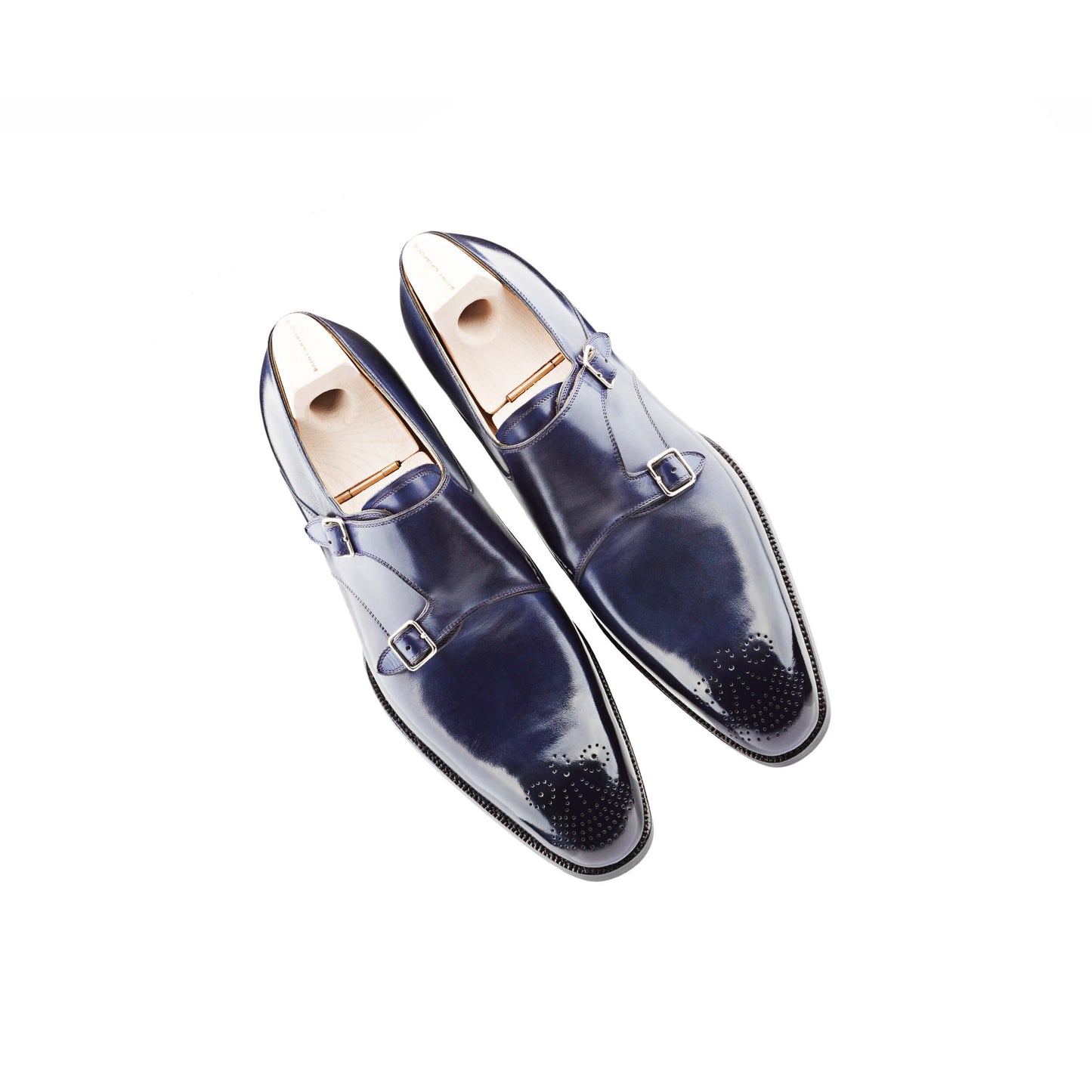 Double buckle monk with medallion