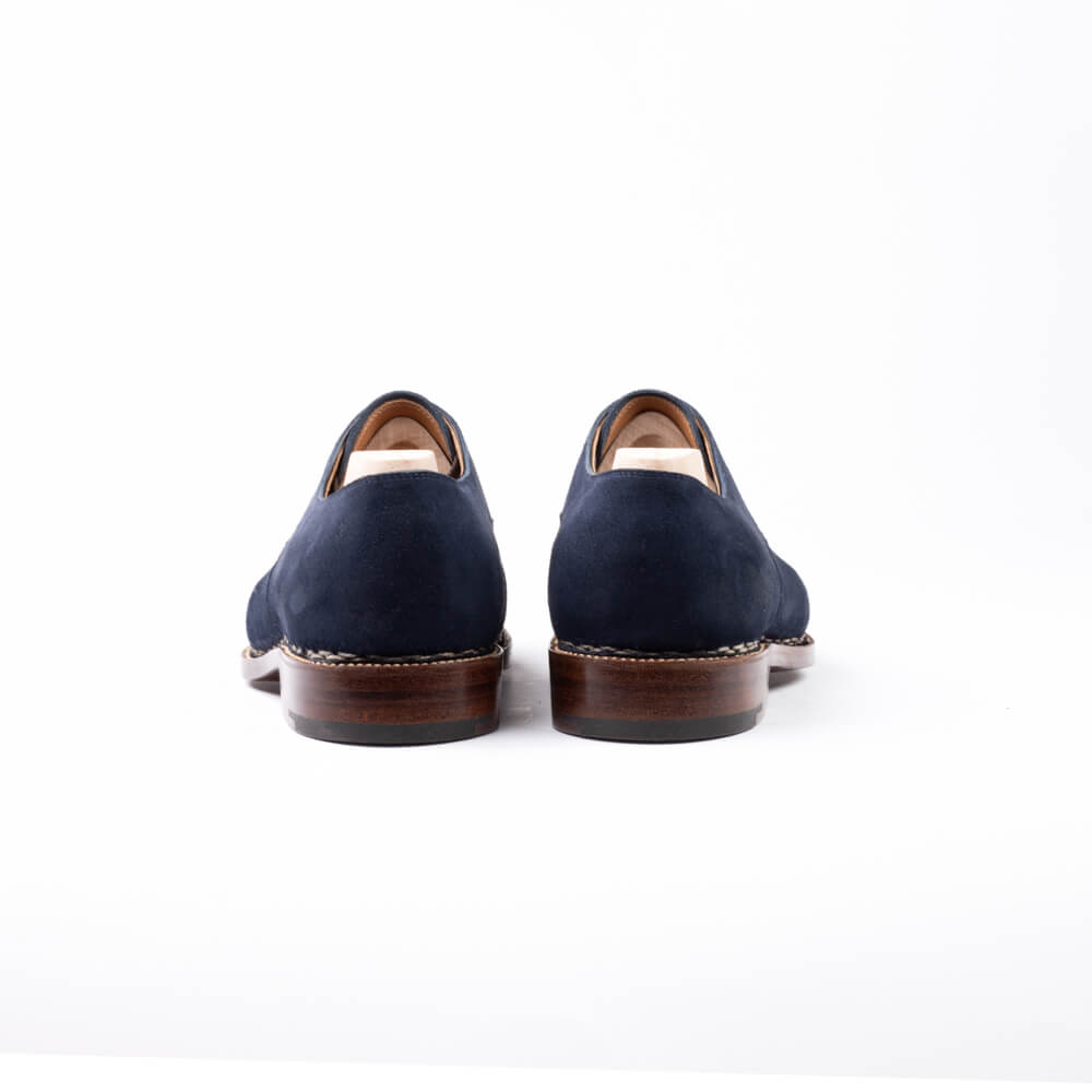 Five eyelet Derby in dark blue Janus Calf with copper eyelets