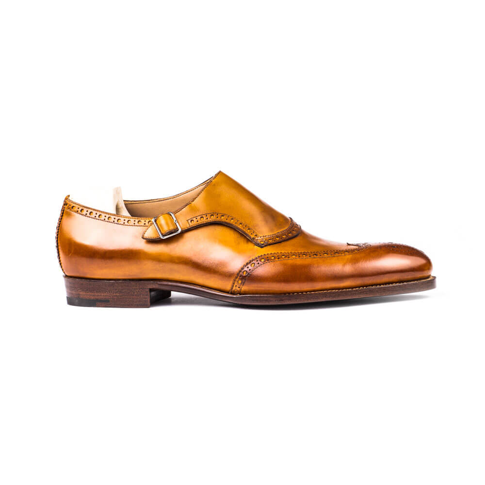 Single buckle monk with long wing and fully brogued