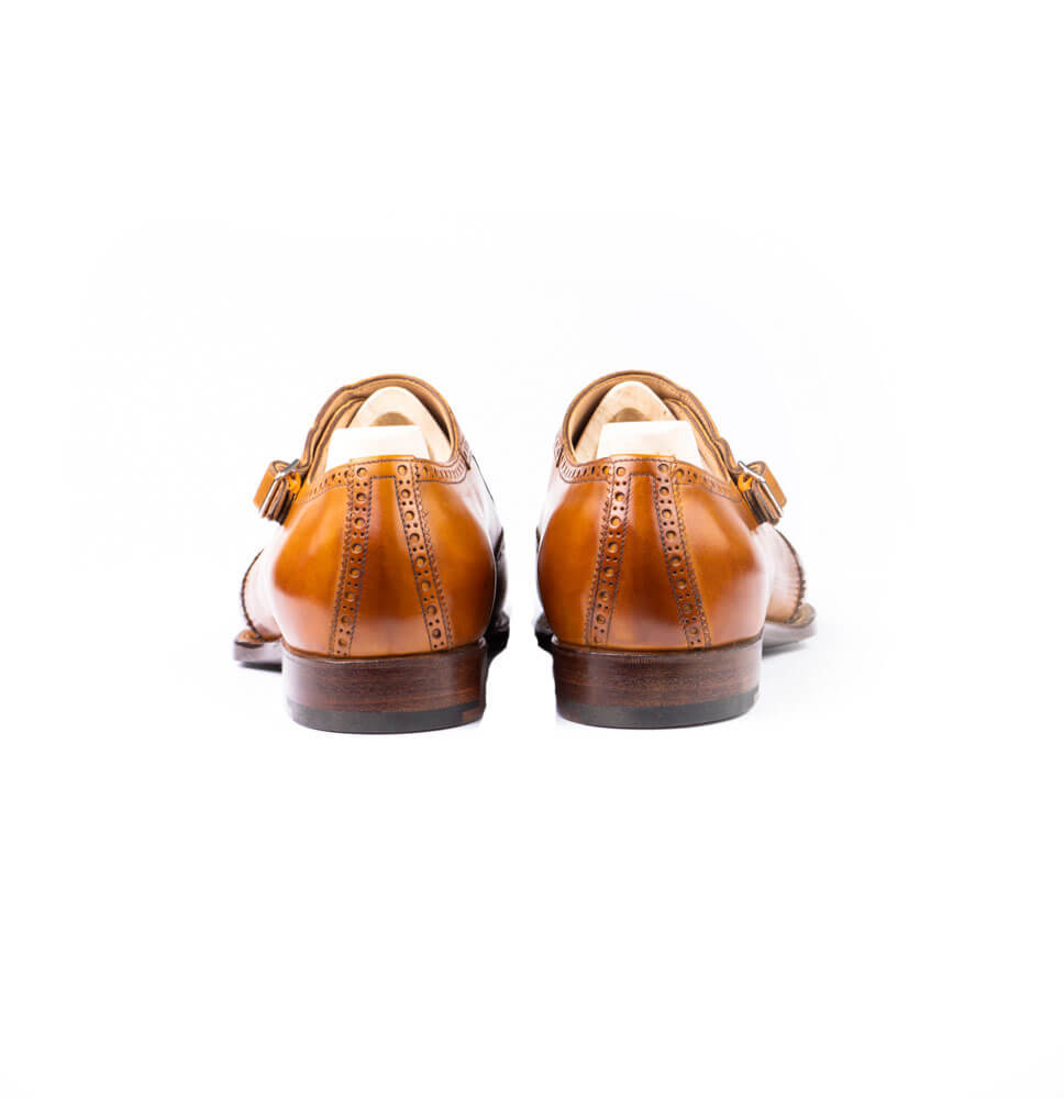 Single buckle monk with long wing and fully brogued