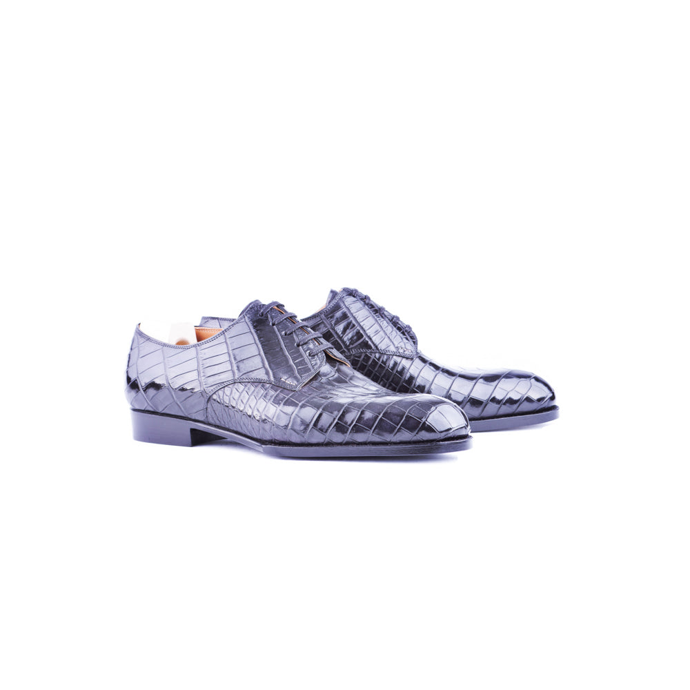 Five eylelet Derby with plain tip in black Croc leather