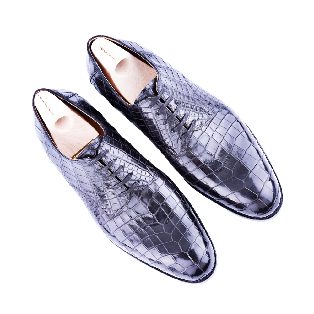 Five eylelet Derby with plain tip in black Croc leather