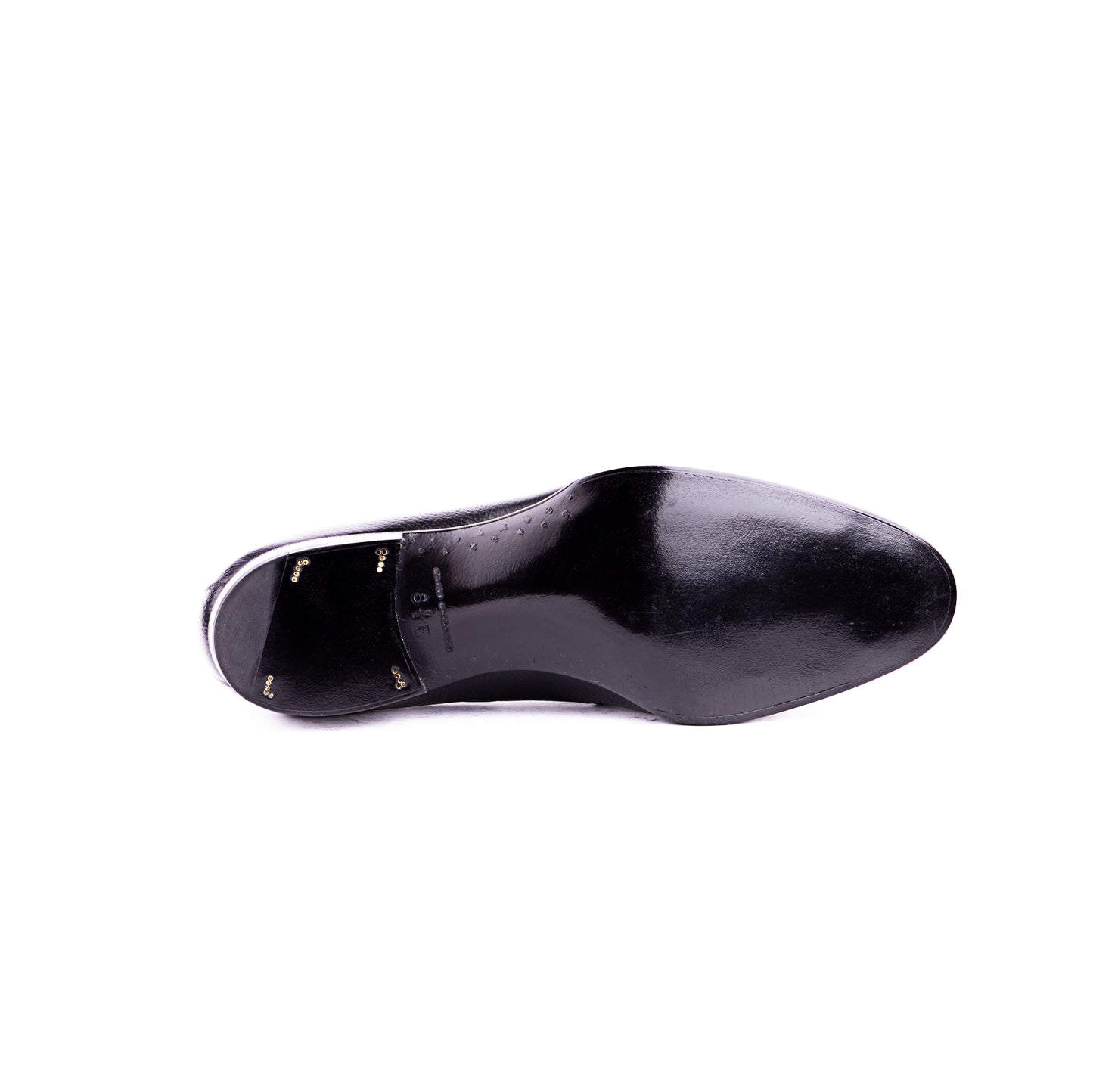 Loafer with hand stitched apron and tassels, short vamp