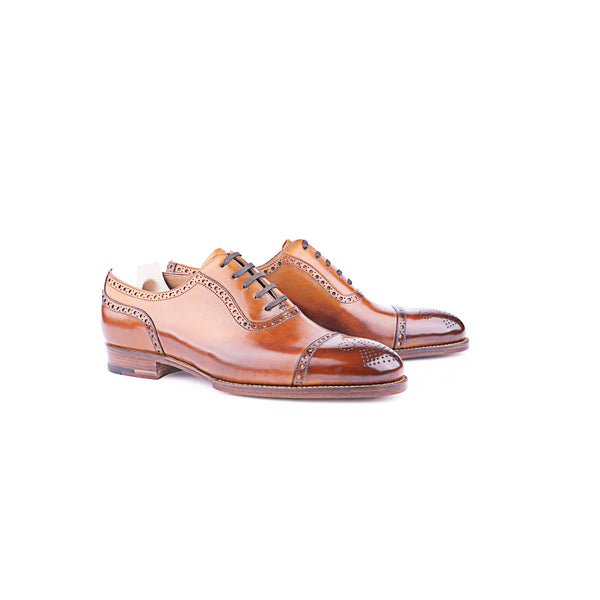 Oxford, straight cap toe with double machine stitched upper with