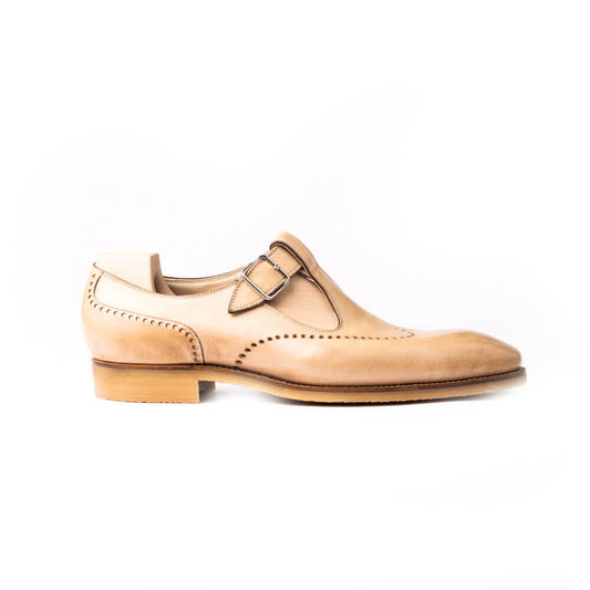 Single buckle Monk sandals, perforated long wing tip