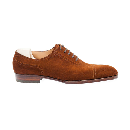 Oxford, plain sewn, straight toe box and sparingly perforated vamp