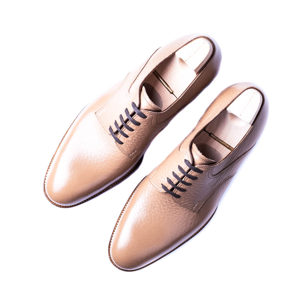 Saddle derby in beige brown shrunken calf with plain tip