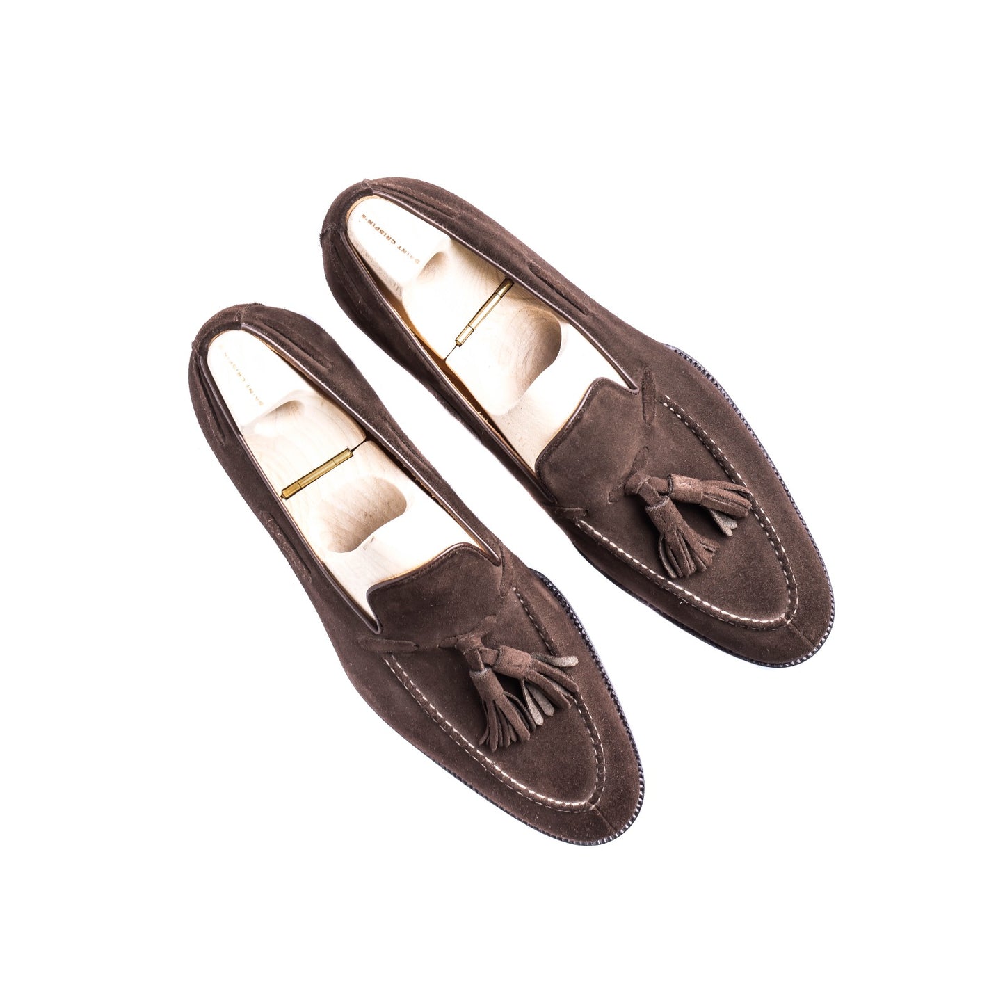 Loafer with hand stitched apron and tassels